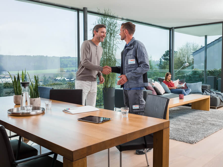 HVAC Installer Shaking Hand of Client