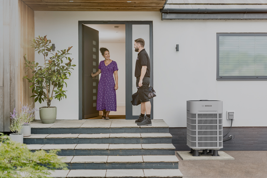 HVAC Technician Greets Client at the Door