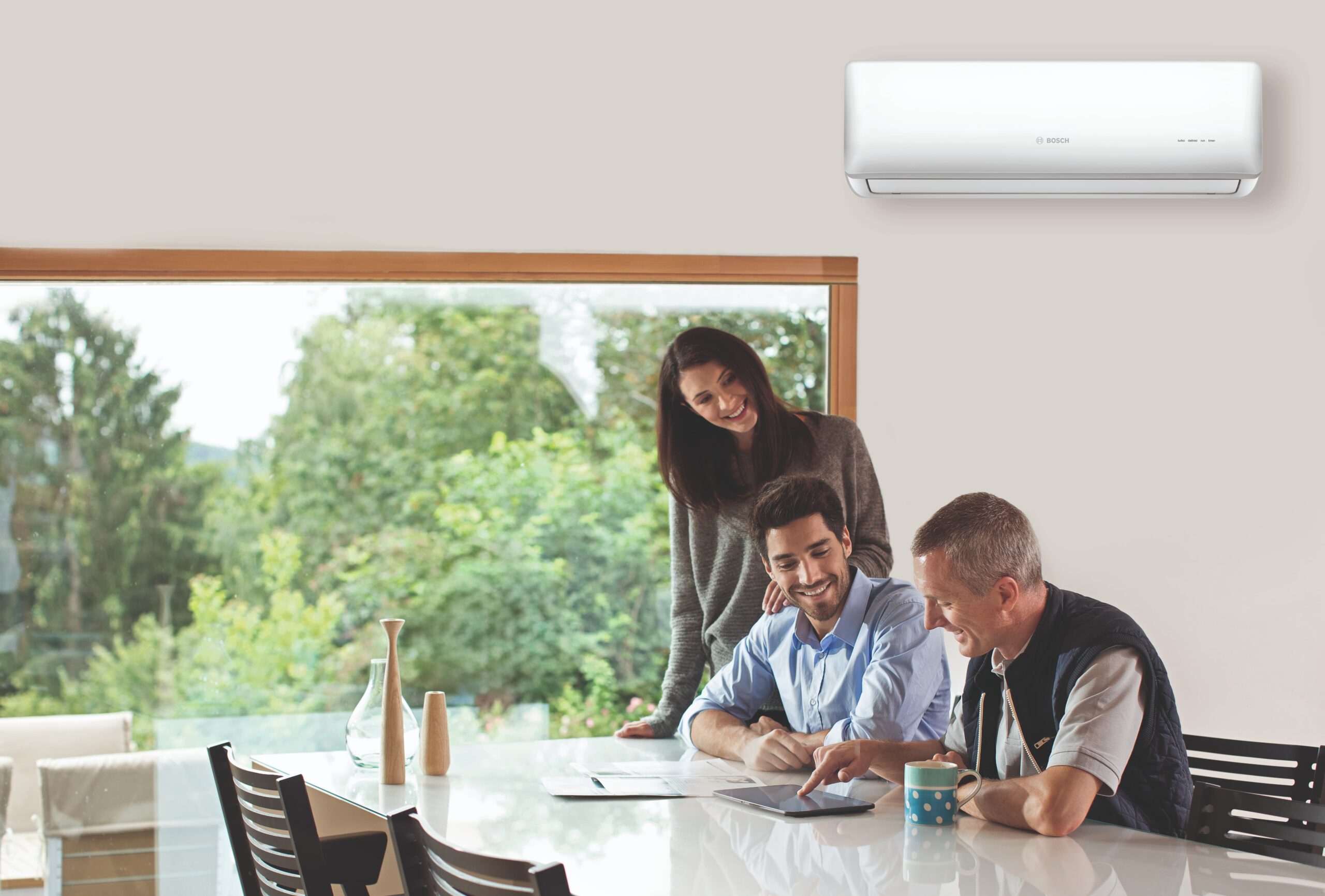 Couple reviewing Ductless HVAC plans with an expert